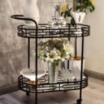 عربه تقديم بلون اسود واسطح مرايه بتصميم انيق وعصري