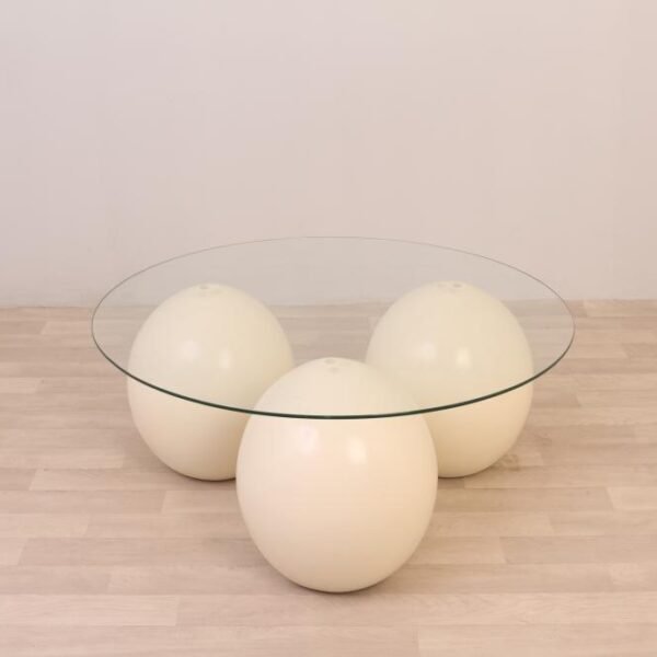 طاولة ضيافة شكل كور رخام ناعم بلون بيج وسطح زجاج