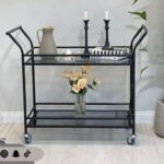 عربه تقديم بلون اسود واسطح زجاج بتصميم انيق وعصري