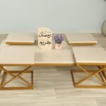 طقم أرضي بسطح خشب شبيه الرخام ومزود بقواعد حديدية